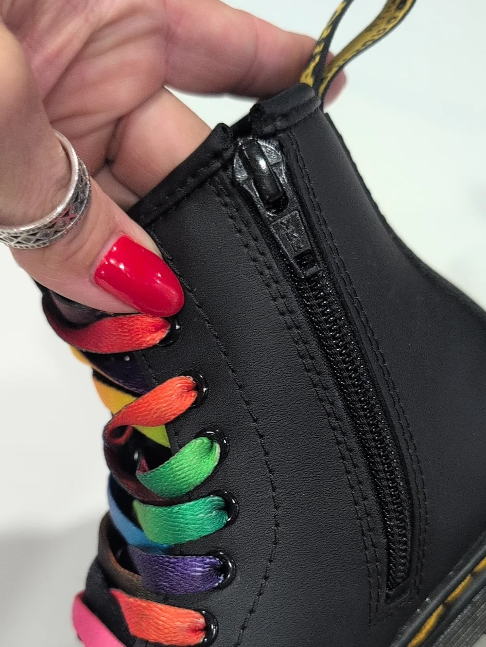 Dr. Martens Black Leather Boots with Multicolor Laces